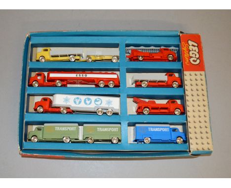 A very scarce Lego System #699 set of Eight HO scale Mercedes Truck Models dating back to 1965 containing Open bed Truck and 