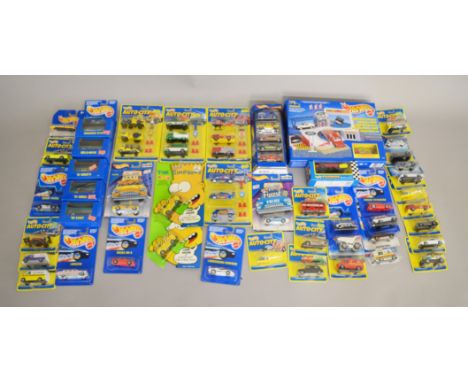 42 Hot Wheels diecast by Mattel which includes; The Simpsons Nuclear Waste Van, Auto-City range 93182, 93182, 93182, 93182, t