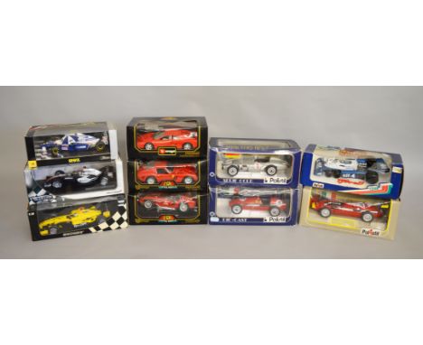 10 boxed diecast Racing Car models in 1:18 scale by Bburago, Polistil, Minichamps, Onyx and Hot Wheels including a Minichamps