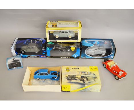 4 boxed diecast models of French cars by Solido, Norev and Maisto in 1:18 scale including        Solido Citroen Presidentiale