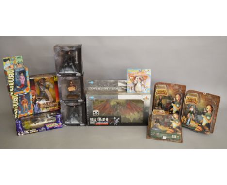 A mixed lot which includes; Back To The Future part 3 1/15th scale time machine, bendable Gizmo, Games of Thrones, Tomb Raide