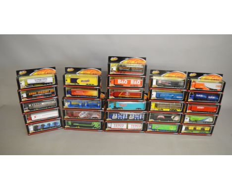 26 boxed Corgi diecast model 1:64 scale trucks, in various different liveries, from the 'Wheelz' range, including 'Sainsbury'