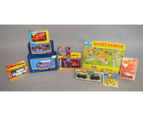 A varied selection boxed and carded diecast models by Matchbox including K-13 Ready Mix Concrete Truck, K-1 Hydraulic Excavat