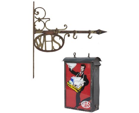 Advertising light box with original glass panel WHS (W.H.SMITH) complete with original wrought iron bracket with WHS initials