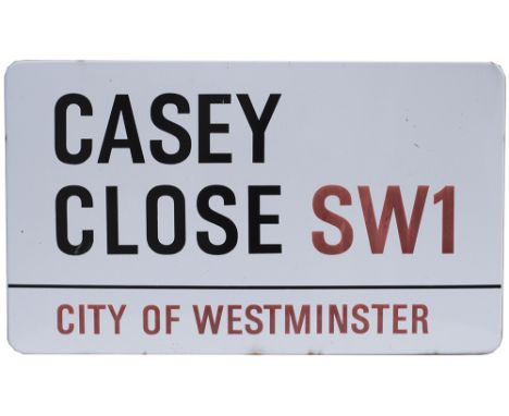 Road enamel sign CASEY CLOSE SW1 CITY OF WESTMINSTER. Fully flanged, measures 30in x 17.5in. In very good condition.