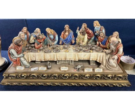 An impressive Capodimonte porcelain group of The Last Supper by Germano Cortese on gilt scroll base, 63cm long