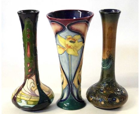 A Moorcroft style vase Old Tupton ware together with two Moorcroft vases, one in the New Dawn pattern signed by Emma Bossons,