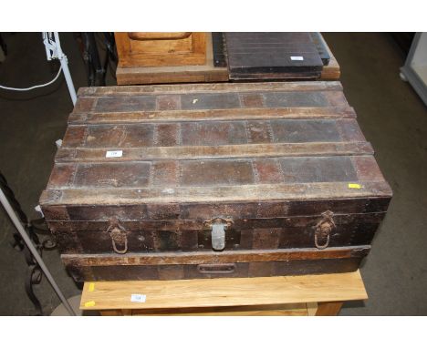 A vintage battened and metal bound trunk