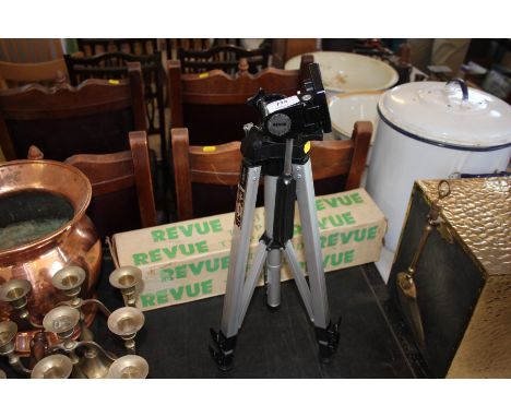 A camera tripod and box