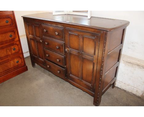 An Ercol type side board 