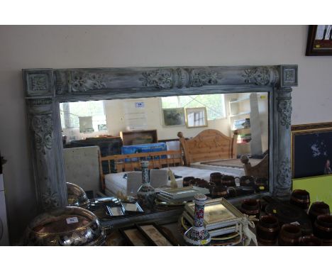 A decorated over mantel mirror 