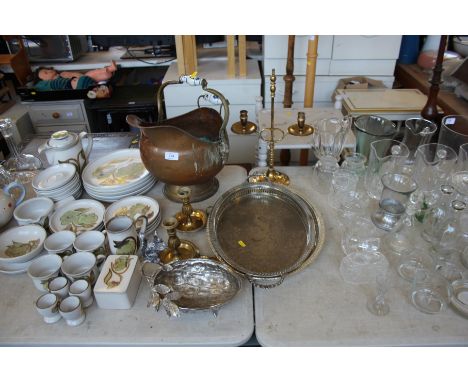A copper coal scuttle; a pair of brass chamber sticks; a brass twin candle light; plated nut dish etc