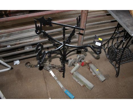 A weather vane; a wire strainer etc