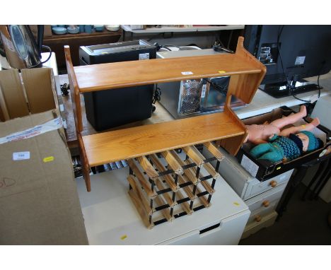 A stripped pine wall shelf and a wine rack