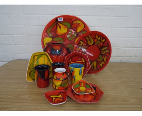 Collection of Poole Pottery including a large Delphis charger, vases, etc..12 pieces