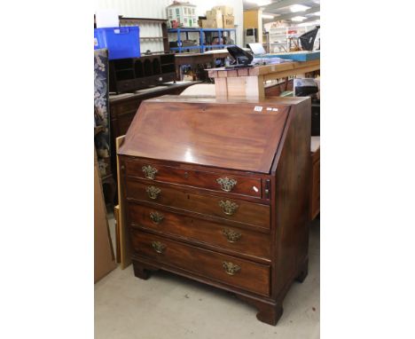 Early 19th century Mahogany Bureau, the fall front opening to a fitted interior, four long drawers raised on bracket feet, 92