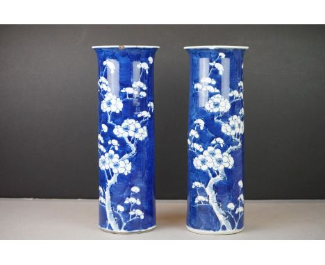 Pair of Chinese Sleeve Vases decorated with Prunus Blossom on a Blue Crackled Ice ground, four Kangxi character marks to base