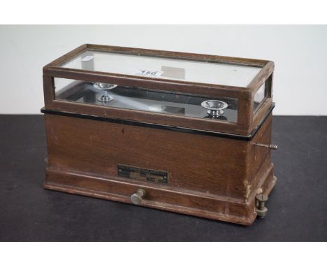 A wooden cased Torsion balance scale by the Torsion Balance Co. of New York. 