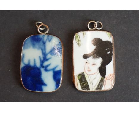 Two oriental ceramic pendants. 