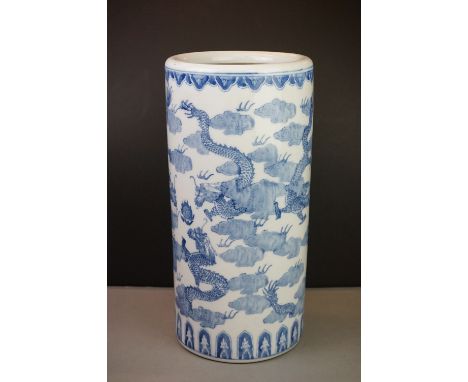 Chinese Blue and White Ceramic Stick Stand decorated with dragons, 46cm high 