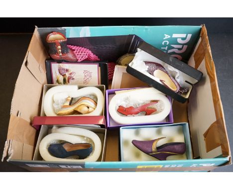 A collection of "Just The Right Shoe" ornaments to include boxed examples together with a compact. 