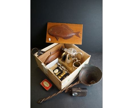 A box of mixed collectables to include silver plate, wooden plaques, brass pan thermometer, coins and tins. 