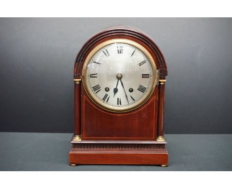 An early 20th century mahogany cased mantle clock with ting tang rack strike anchor escapement by W&amp;H. 