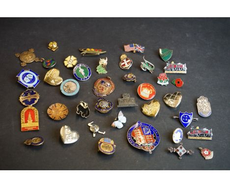 A collection of enamel badges to include fully hallmarked sterling silver examples. 