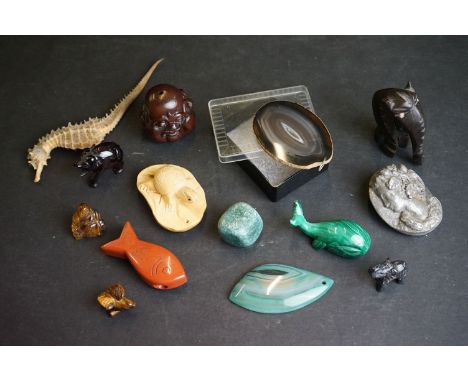 A small group of mixed collectables to include carved stone animals, four face Buddha netsuke and a dried sea horse. 