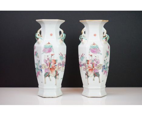 Pair of Chinese Porcelain Famille Rose Hexagonal Vases decorated with processing figures, red seal mark to base, 24cm high 