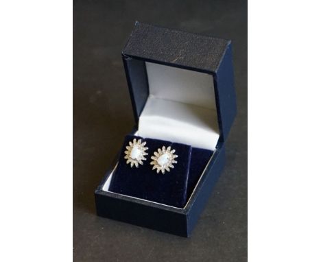 Pair of silver, CZ &amp; opal panelled earrings, cased 