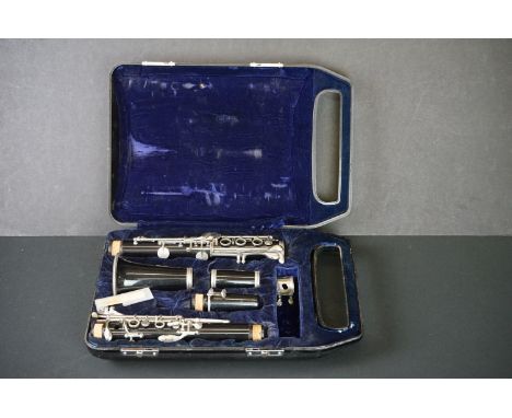A cased clarinet in original fitted case. 