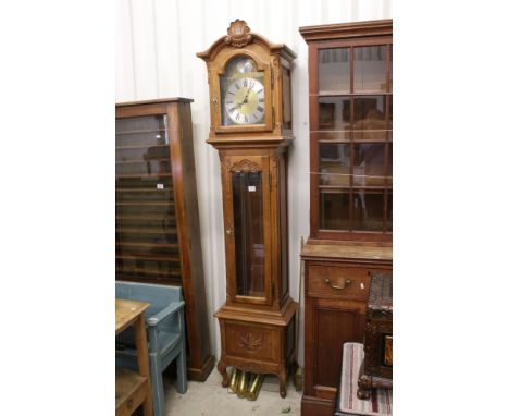 20th century ' Tempus Fugit ' Golden Oak Longcase Clock, the brass and silvered dial with Roman numerals, 217cm high 