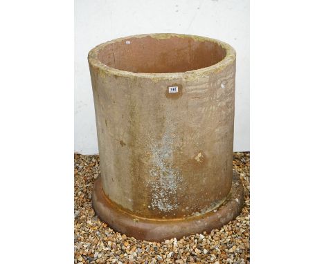 A large industrial stone pipe, suitable for use as an oversized garden planter. Stands approx 80cm in height 