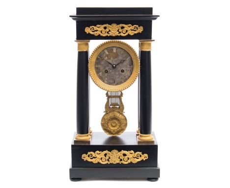 A French ebonised portico clock: the eight-day duration movement striking the hours and half-hours on a bell with an outside 