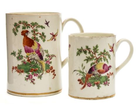 Two graduating First Period Worcester cylindrical mugs: with grooved strap handle each enamelled front and verso with fancy b