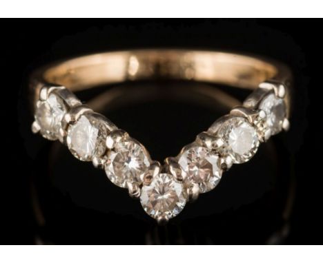 A diamond mounted seven-stone ring: with circular, brilliant-cut diamonds estimated to weigh a total of 1.0cts, the shank sta