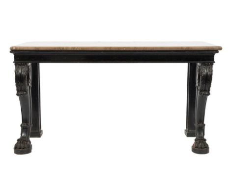 A Victorian carved ebonised rectangular console table:, surmounted by a panel of brown fossilized marble, on acanthus leaf sc