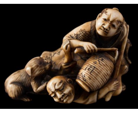 A Japanese carved ivory okimono, signed Hojitsu: depicting two drunken men, one carring a paper lantern inscribed 'Mind the F