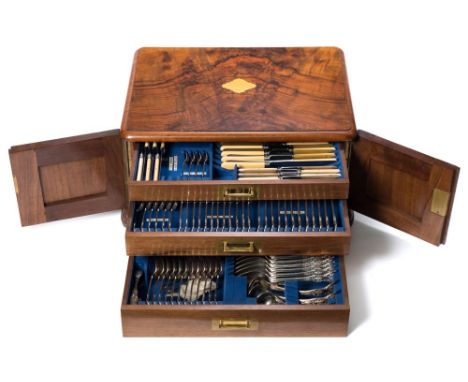 An Edwardian plated Kings pattern flatware service: includes part carving set, twelve table knives, twelve dessert knives, fo