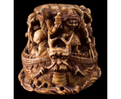 A Japanese carved ivory netsuke, signed Meigyoku: in the form of a Takarabune, the seven gods of good fortune looking out fro