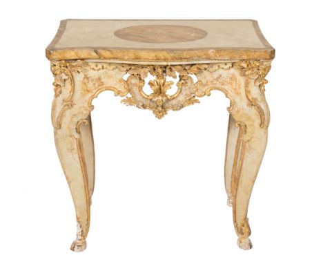 A carved giltwood and decorated console table:, of serpentine outline in the 18th Century taste, the faux marble banded top w