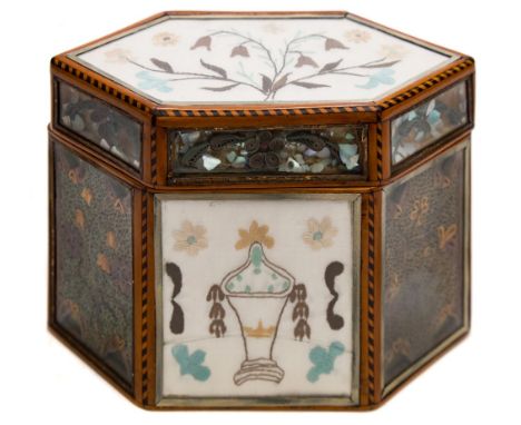 A George III quillwork, satinwood and inlaid tea caddy: of lozenge-shaped outline, the glazed top and side panels decorated w
