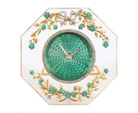Asprey, London a gold, diamond and enamel strut clock: the octagonal glass case having applied gold, diamond and green enamel