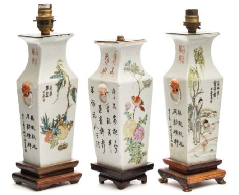 A pair of Chinese porcelain vases and one similar: each of square shouldered profile with mask and ring handles, the former d