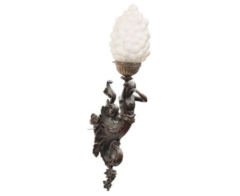 A late 19th century bronzed metal wall light: the foliate scroll and grape decorated backplate with female caryatid supportin