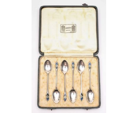 A set of six Liberty silver and enamel coffee spoons, maker W H Haseler Ltd, Birmingham, 1914: the oval bowls with slender st