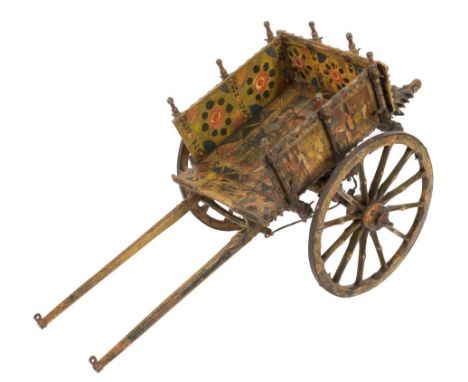 A 19th Century Italian painted two wheeled dog cart:, decorated with panels of courtly figures and knights in armour and with