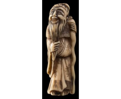 Two Japanese ivory netsuke: the first of a Chinese sage wearing a wide brimmed hat and robes, 18th century, 5.5 cm high; the 
