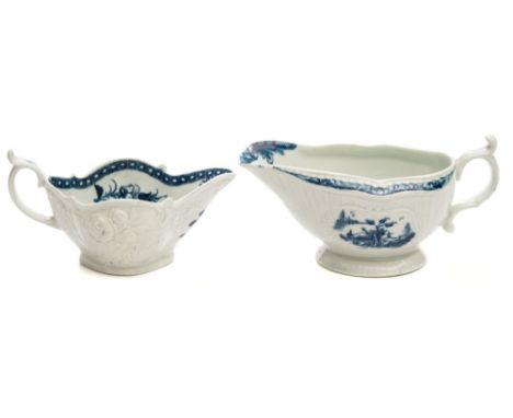 Two First Period Worcester porcelain sauce boats: one of strap moulded form painted in blue in the Fisherman and Billboard Is